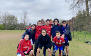 Junxin and his football team in a group photo