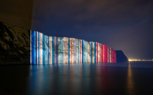 The Climate Stripes projected onto the White Cliffs of Dover