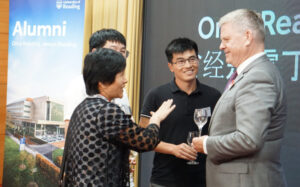 The Vice-Chancellor speaking with alumni at the Beijing Alumni Reception