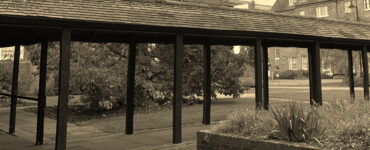London Road cloisters in sepia