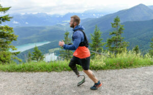Jamie Gane running with a mountain view in the background