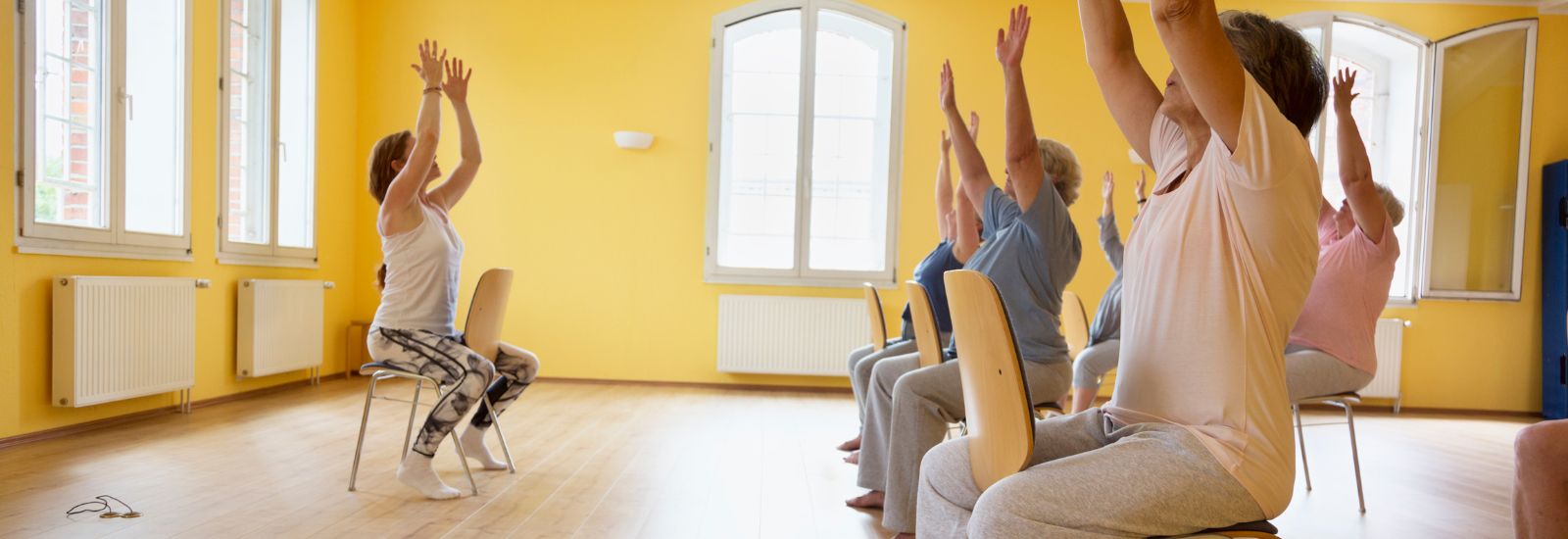 A sitting pilates class