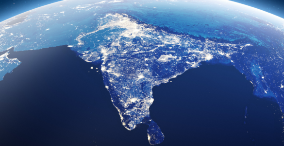 An aerial view of the globe with India lit up.