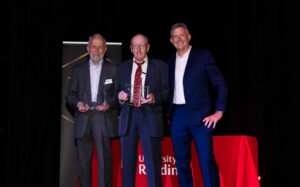Don and John with the Chancellor receiving their awards