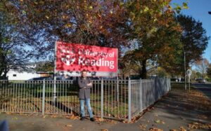 Feras standing in front of the University of Reading Whiteknights campus