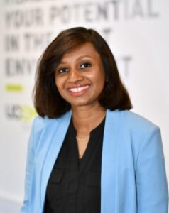 Tharindu smiling at the camera