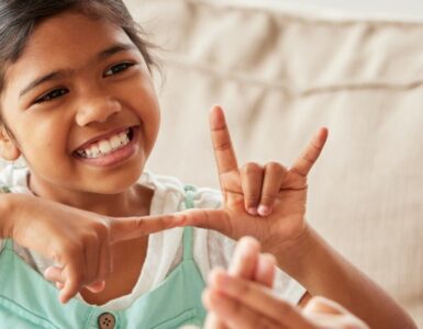 Girl communicating using sign language