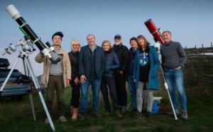 Image of Karen-Anne and some organisers setting up for a stargazing event