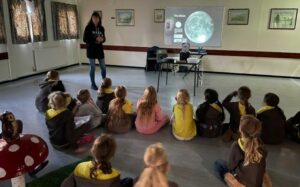 Image of Karen-Anne presenting to a Girlguiding group