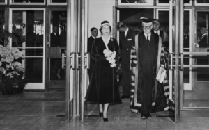 Photograph of HRH Queen Elizabeth II and the Chancellor, Lord Templewood, the Faculty of Letters building after the formal opening (22 March 1957)