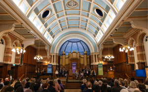 An audience watching the Chancellor's Award ceremony in the Great Hall at Reading  