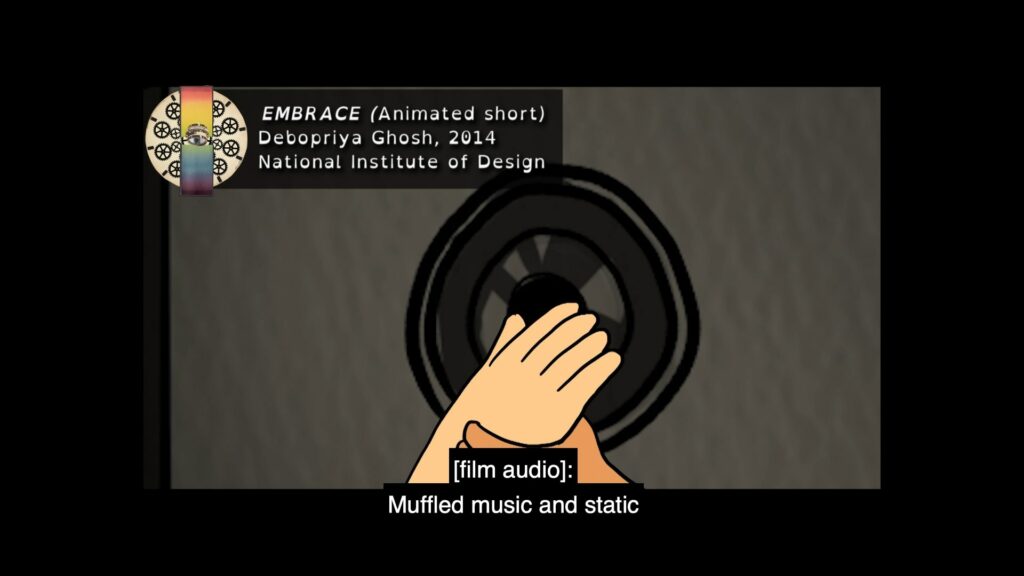 A screenshot from an animated film. We see two hands, one on top of another, feeling the vibration of sound from a speaker. On the top-left is the following text that identifies the film and production details: Embrace (Animated Short), 2014, Debopriya Ghosh, National Institute of Design. The caption reads [Film Audio]: Muffled Music and static.