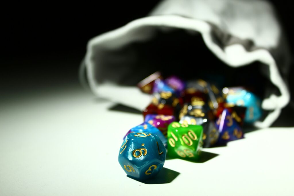 Dice rolling out of a bag