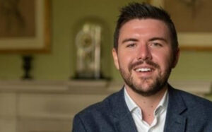 James Fletcher smiling at the camera