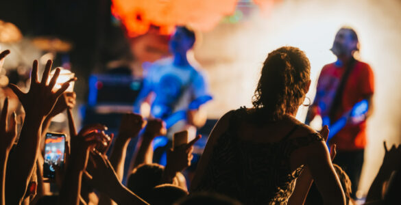 A band performing to crowd
