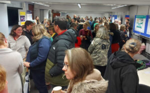 Crowd of people at the launch of the Autism Wellbeing hub.