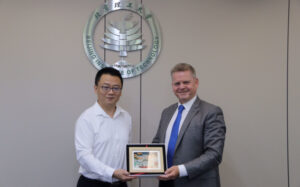 Robert Van de Noort with a colleague at the Beijing Institute of Technology holding a certificate