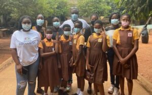Carl with some of the girls he works with in Ghana