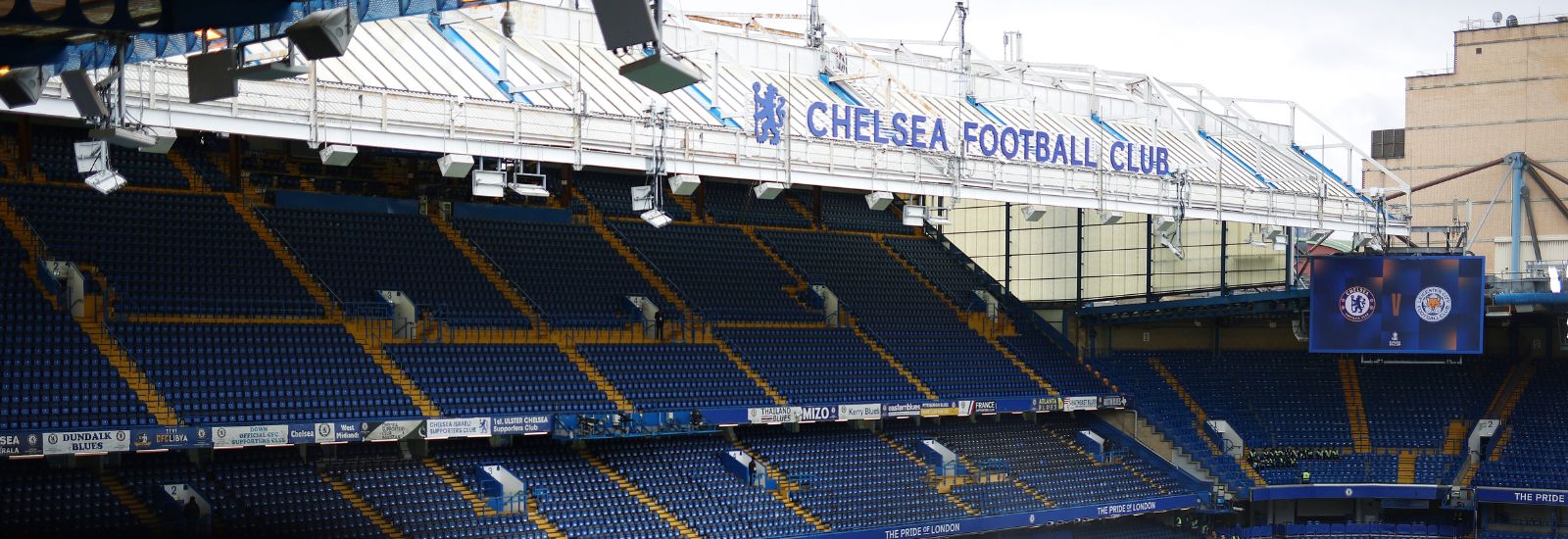 Inside Chelsea Football Ground looking across the stadium at a stand of seats