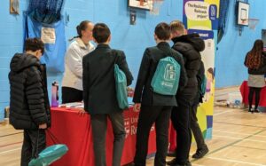School children at a  Resilience Rucksack stand at a school resilience fair