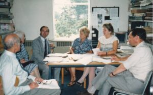Peter sat with colleagues in an editorial meeting for the Reading Reading magazine