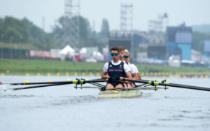 Ed with teammates, Frankie Allen, Josh O’Brien, Giedrė Rakauskaitė and Erin Kennedy, rowing.
