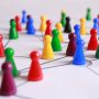 A Decorative image of board game counters placed to portray strategy.